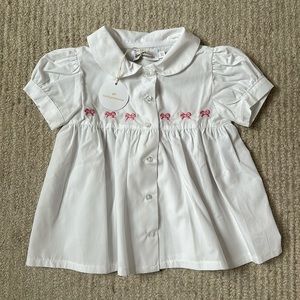 Sal & Pimenta white puff sleeve top with pink bows